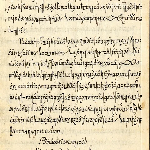 Beáta Megyesi An encrypted page from the Copiale cipher covered in handwritten symbols and letters (Credit: Beáta Megyesi)